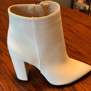 White pointed toe ankle booties